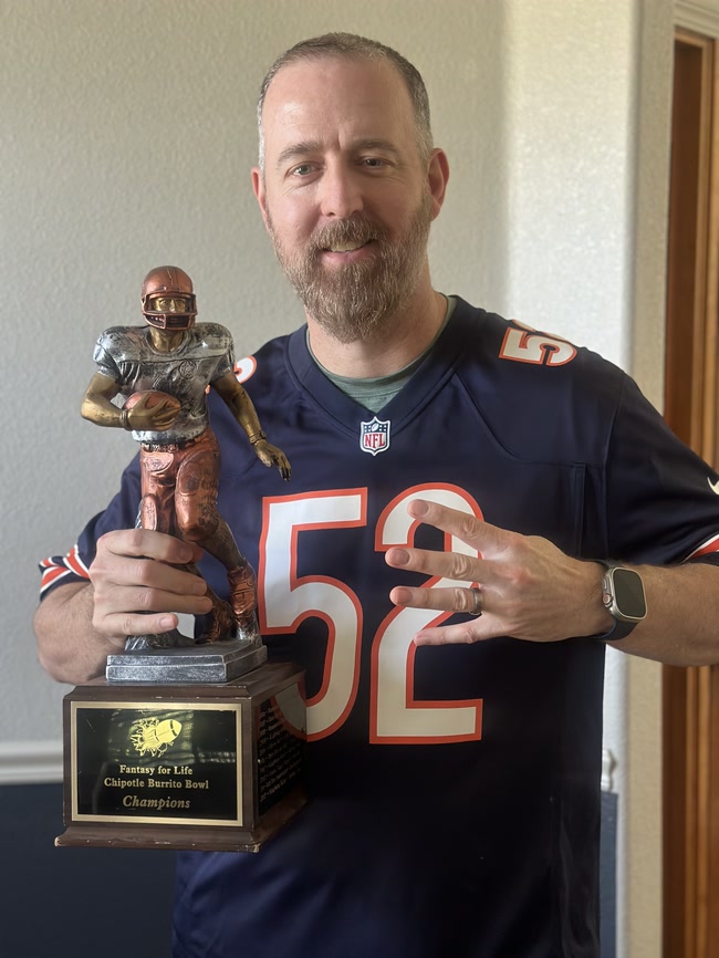 The Kingsburg Killaz owner with the championship trophy